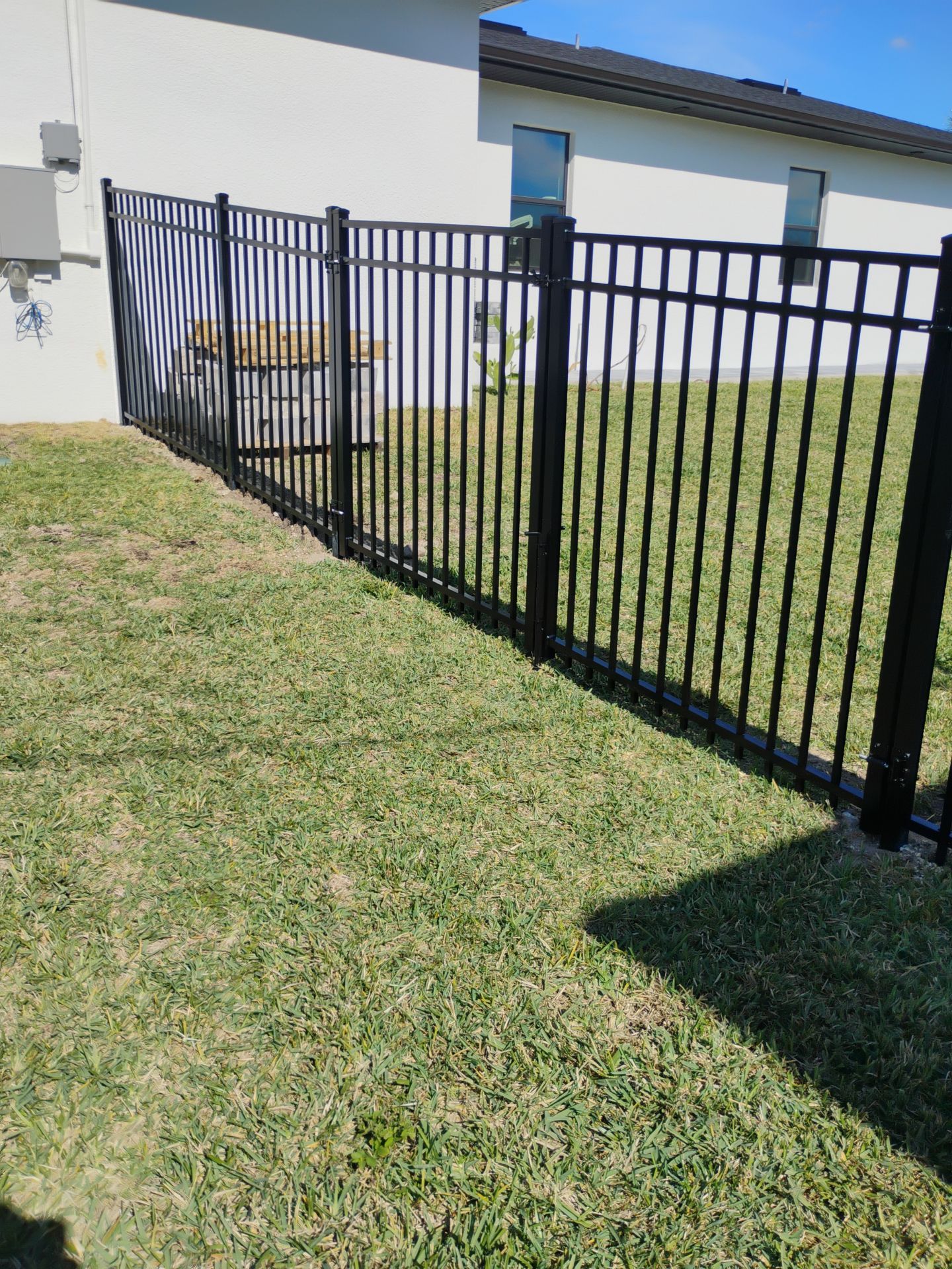 Bronze Aluminum Fence in Cape Coral by True Fence LLC