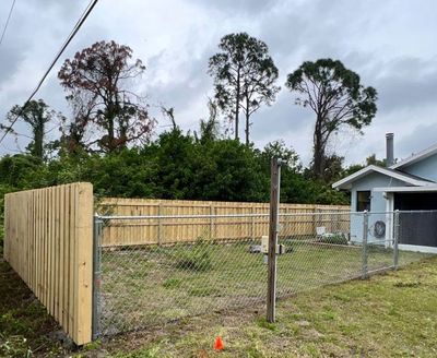 Wood Fence Installation using Wood and Chainlink Fence