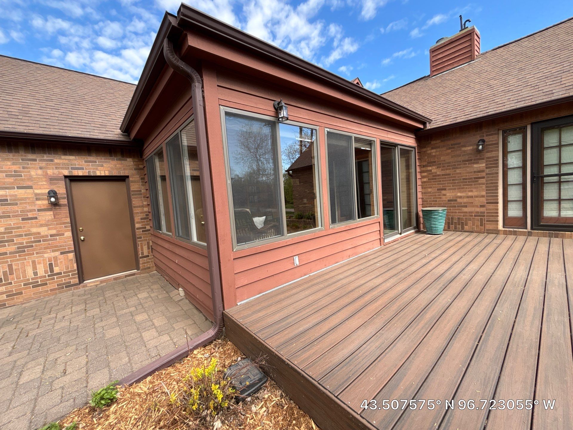 Sioux Falls Exterior Painting and Solid Color Deck Staining by Select Painting, Coatings & Garage Cabinets