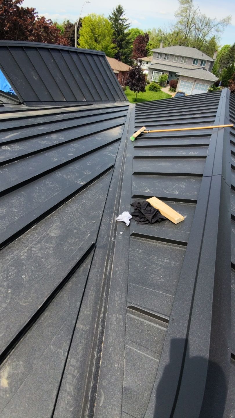 Residential Roofing Installation using 16" Standing Seam Panels by Jay Carter Roofing & Sheet Metal