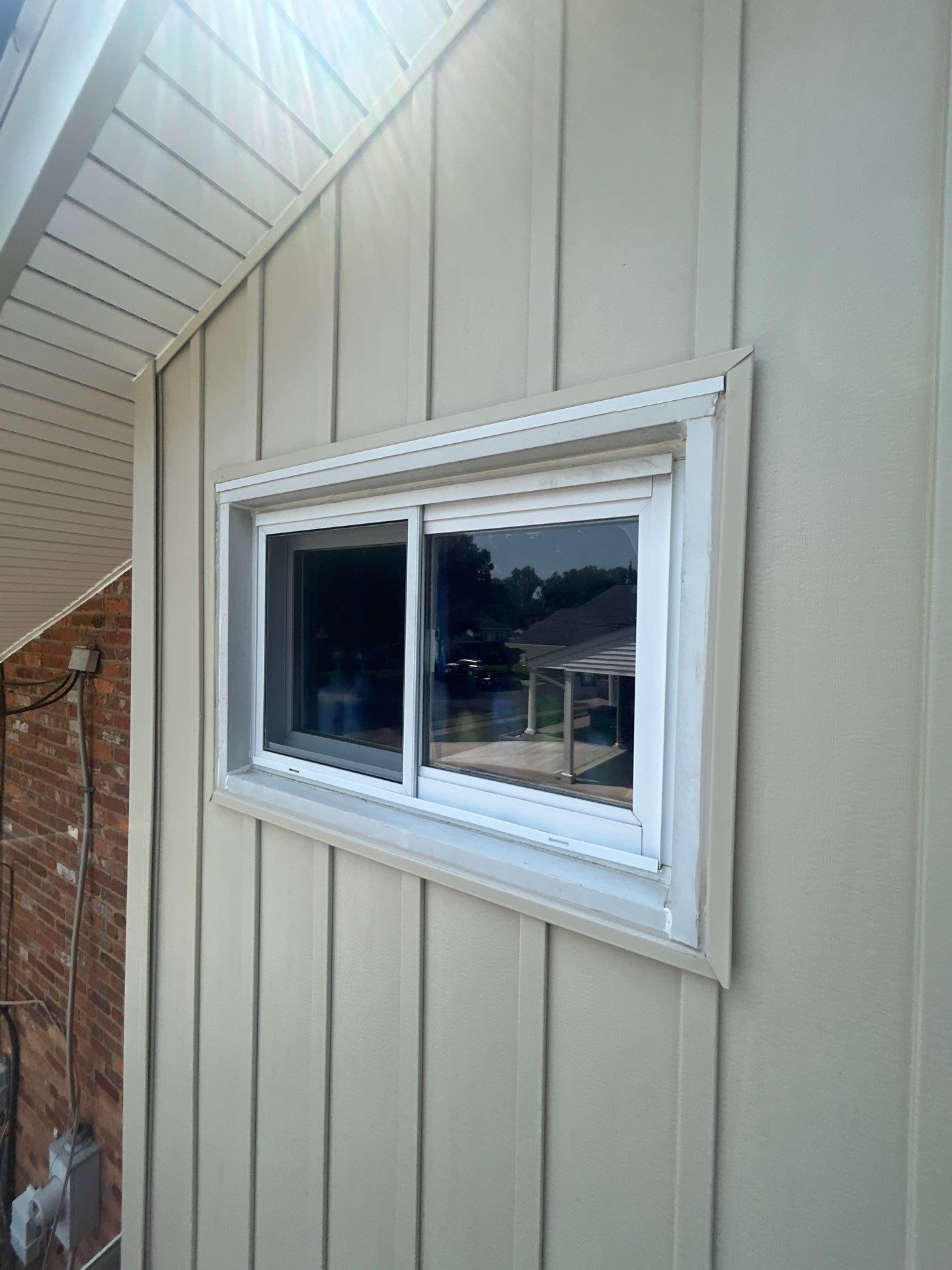 Fairfax: Residential Siding Replacement with CertainTeed 8" Board and Batten Siding in Desert Tan by RM Banning, Inc.