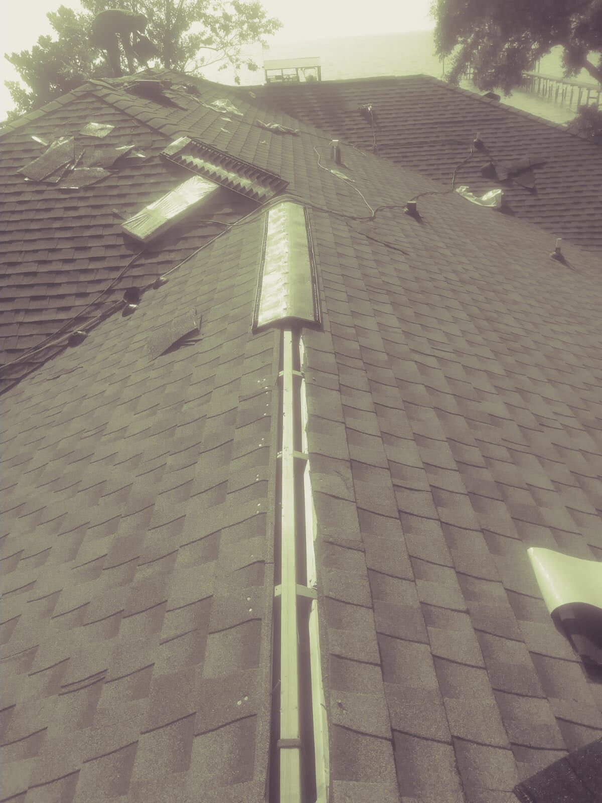 Residential Roofing Installation using Roof Replacement by American Roofing & Construction LLC