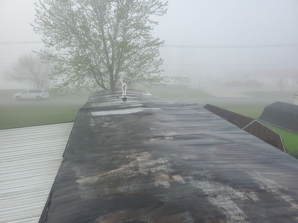Residential Roofing Installation using 60 mil rubber roof  by Nitro Roofing and Construction