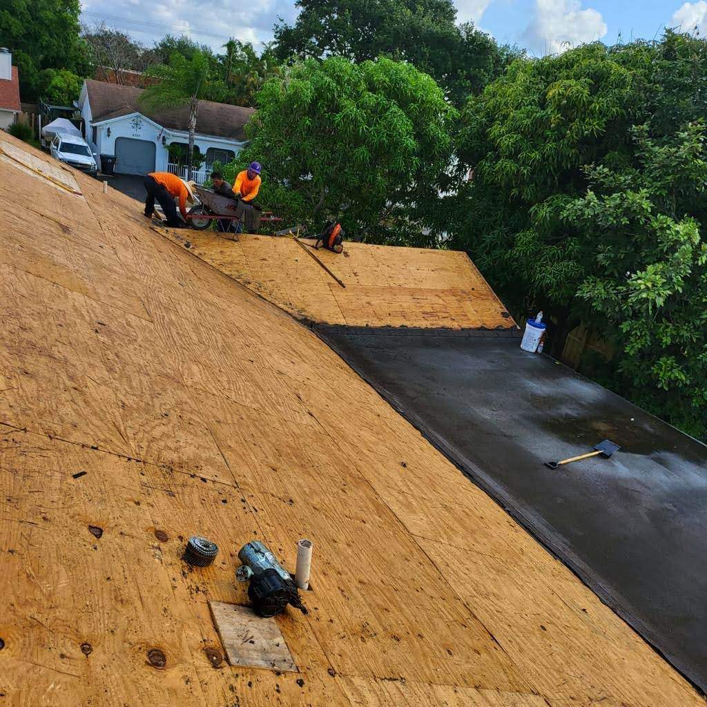 Standing Seam Metal & Flat Re-Roof using 1.5" Nail Strip 24ga Solar White Kynar Coated Standing Seam Metal Panels by Morton Roofing, Inc.