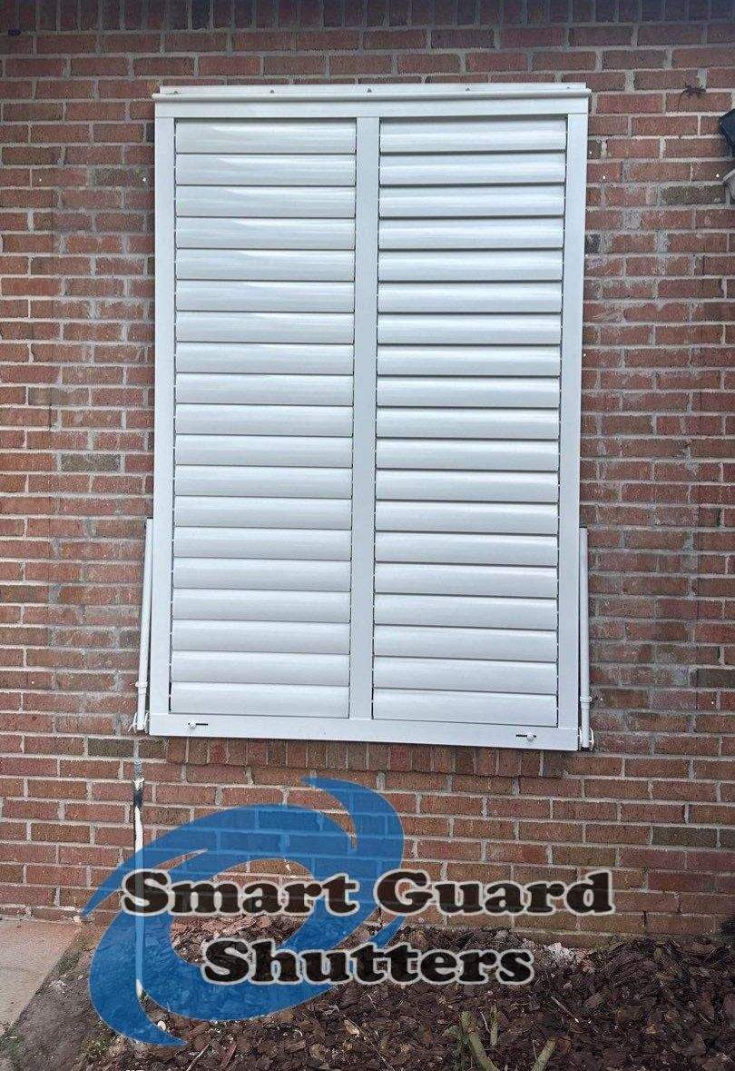 Impact Bahama Shutters in Signal White by Smart Guard Shutters