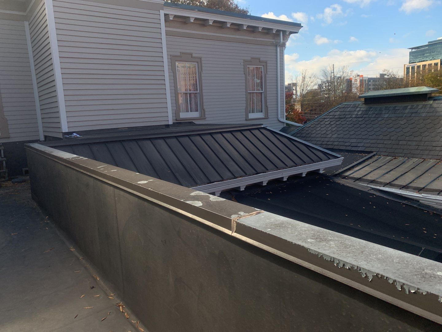 Re-roof by American Roofing NC