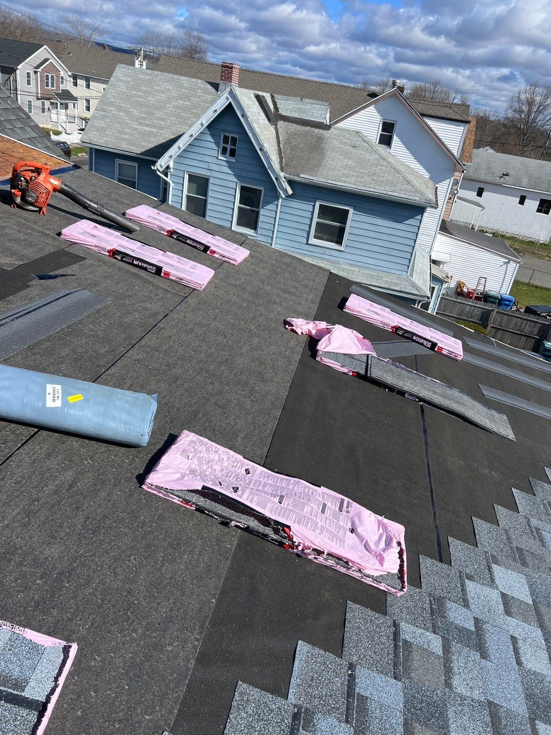 Atlantic Blue Shingles by Reimagine Roofing