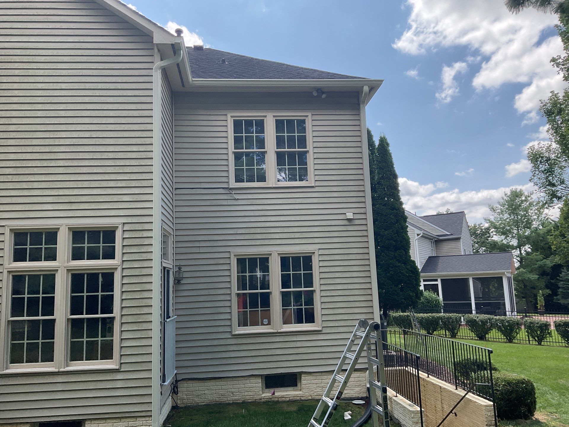 New Gutters, New Floor, New steps, New Paint job by Alpha Design Services