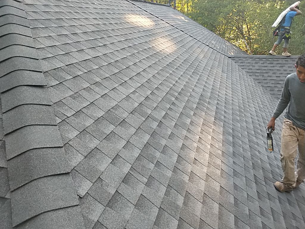 Residential Roofing Installation using Roof Replacement by American Roofing & Construction LLC