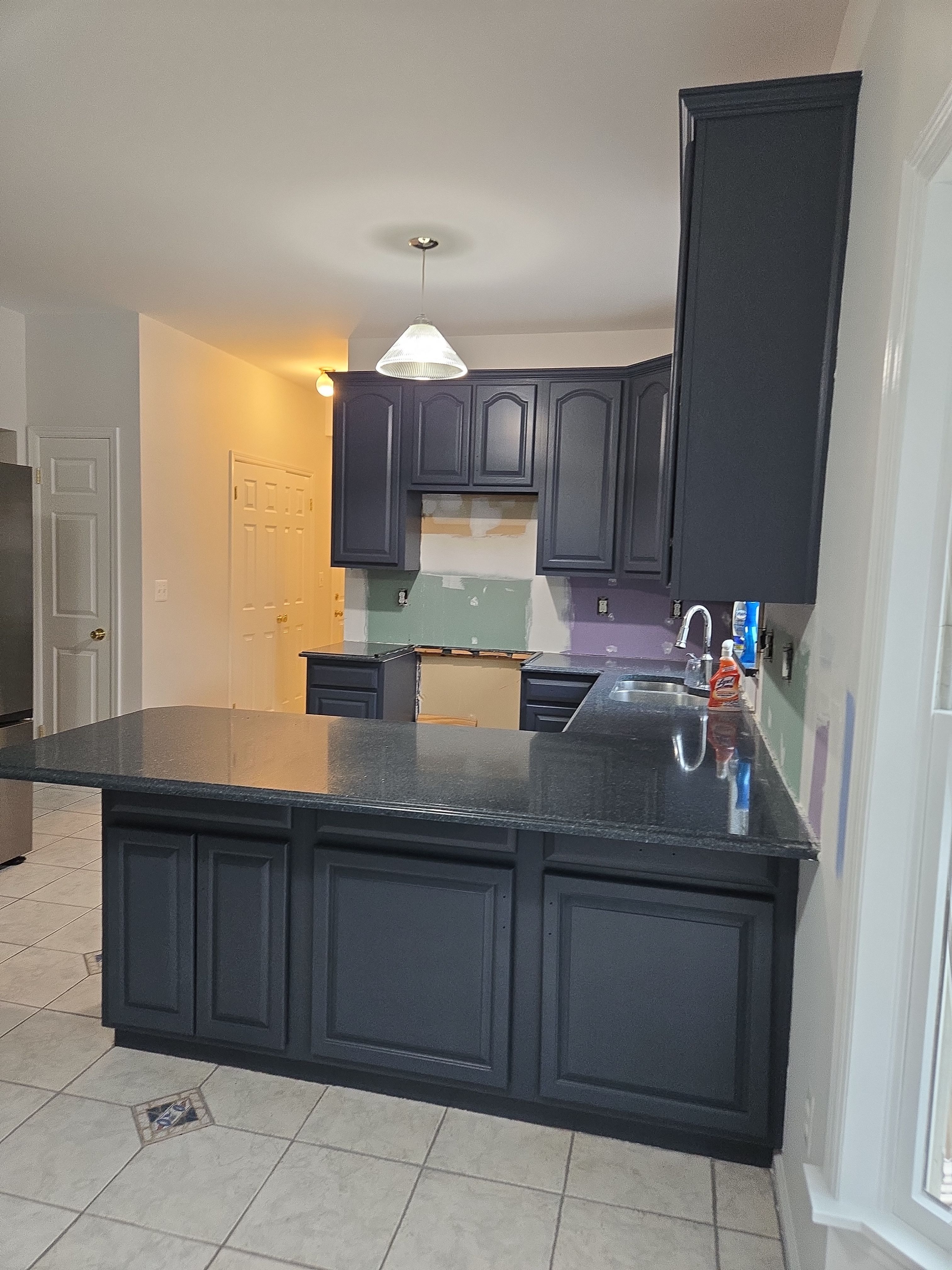 Cabinet Refinishing using Benjamin Moore Command by Spectrum Painting, LLC
