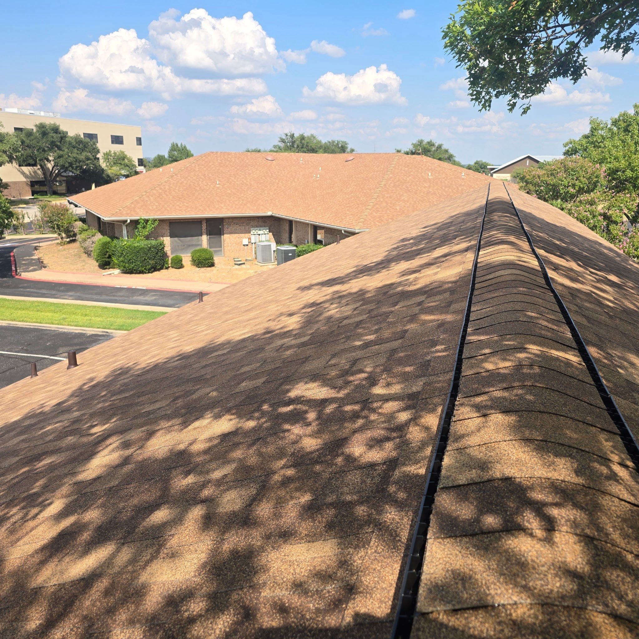 Commercial Roof Replacement using ATLAS StormMaster Shake by Harvey Roofing & Construction