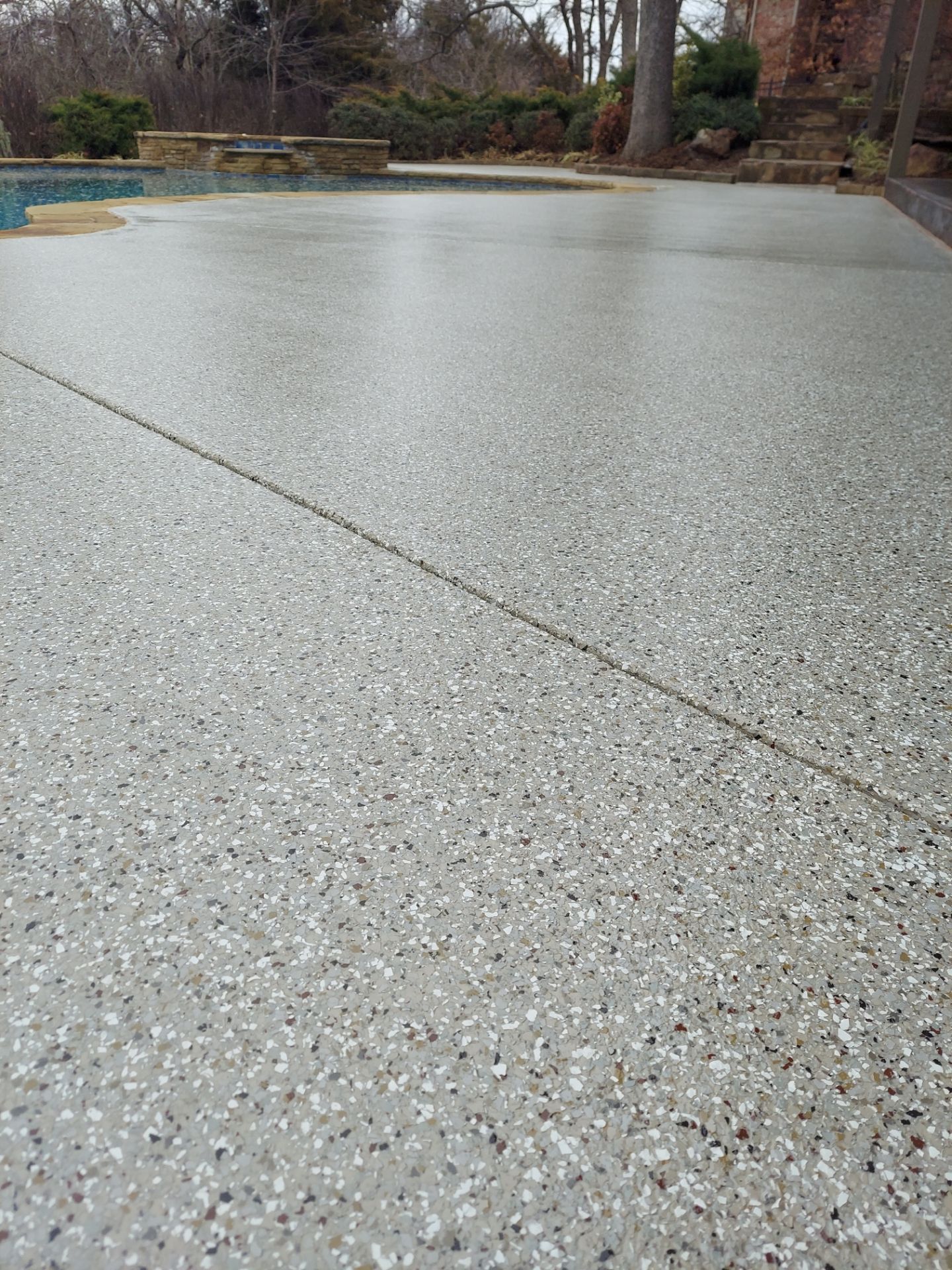 Pool Deck Install with Pebble Beach by Copperhead Coatings