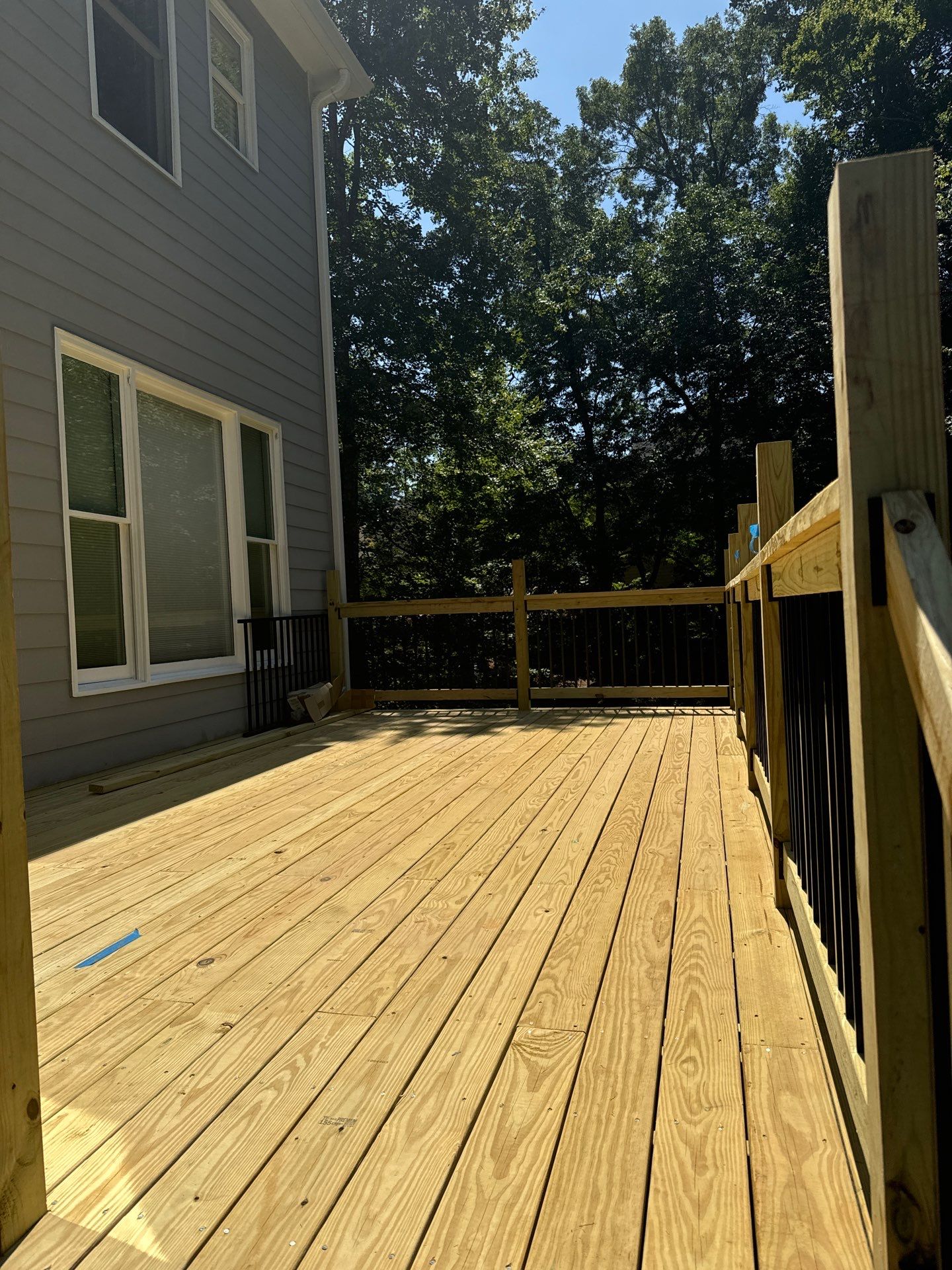 Pressure-Treated Wood Deck Replacement with Metal Balusters in Acworth by Swift Home Renovations