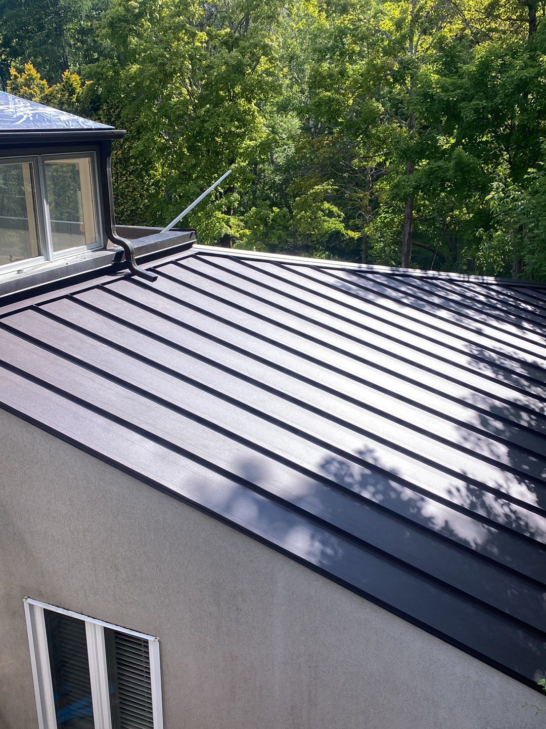 Roof Replacement using 16" Standing Seam Panels by Jay Carter Roofing & Sheet Metal