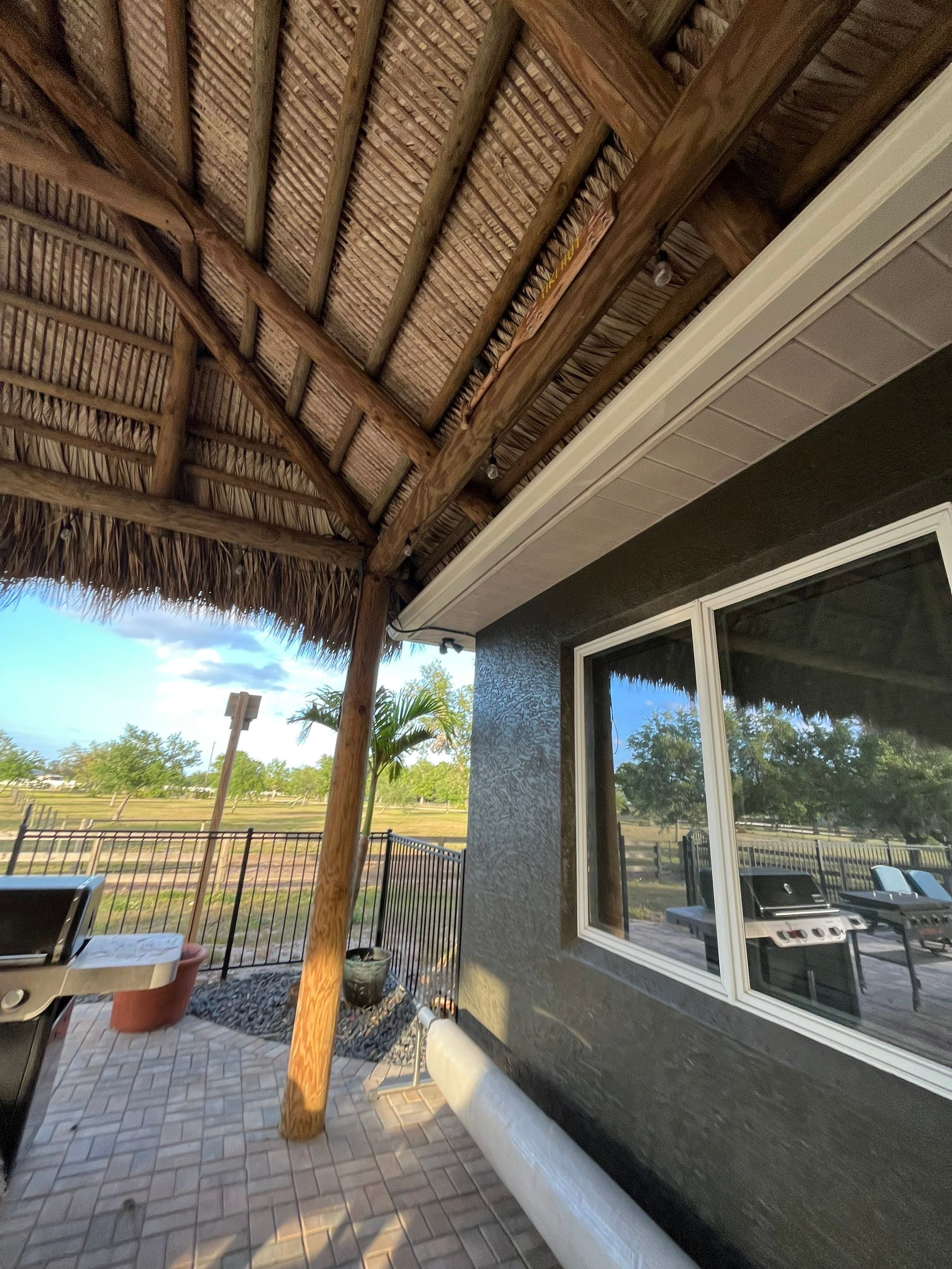  7-inch White seamless gutters and downspouts in Myakka City FL by Gutter Professors