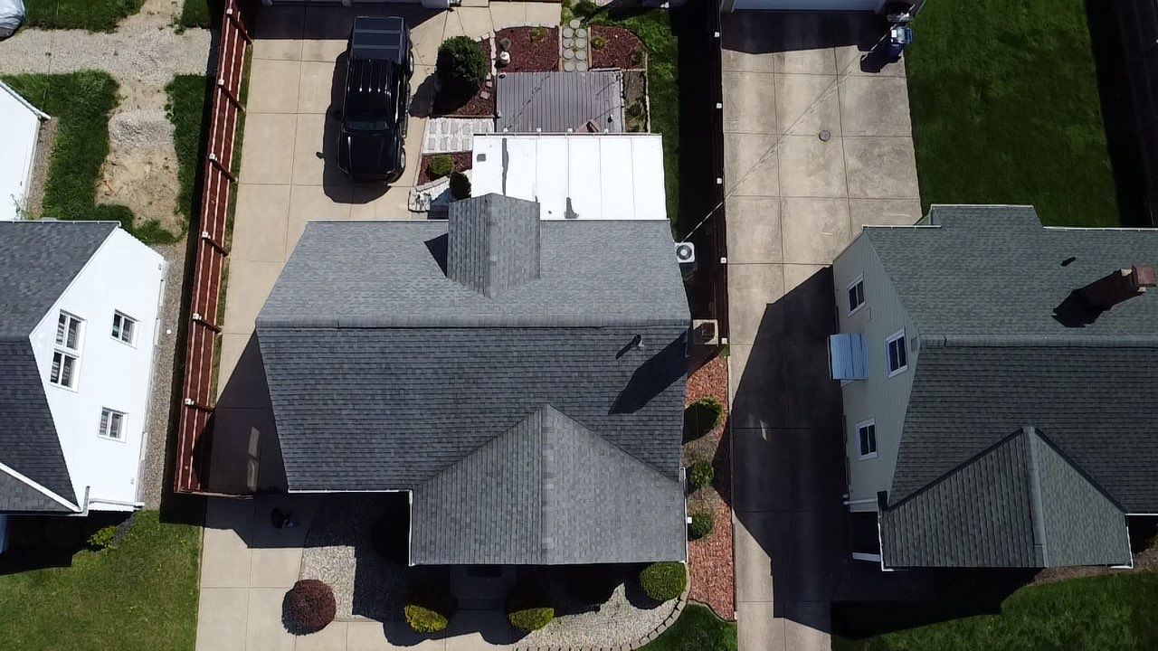 Cleveland Roof replacement - Charcoal shingles by Atlas Roofing & Restoration