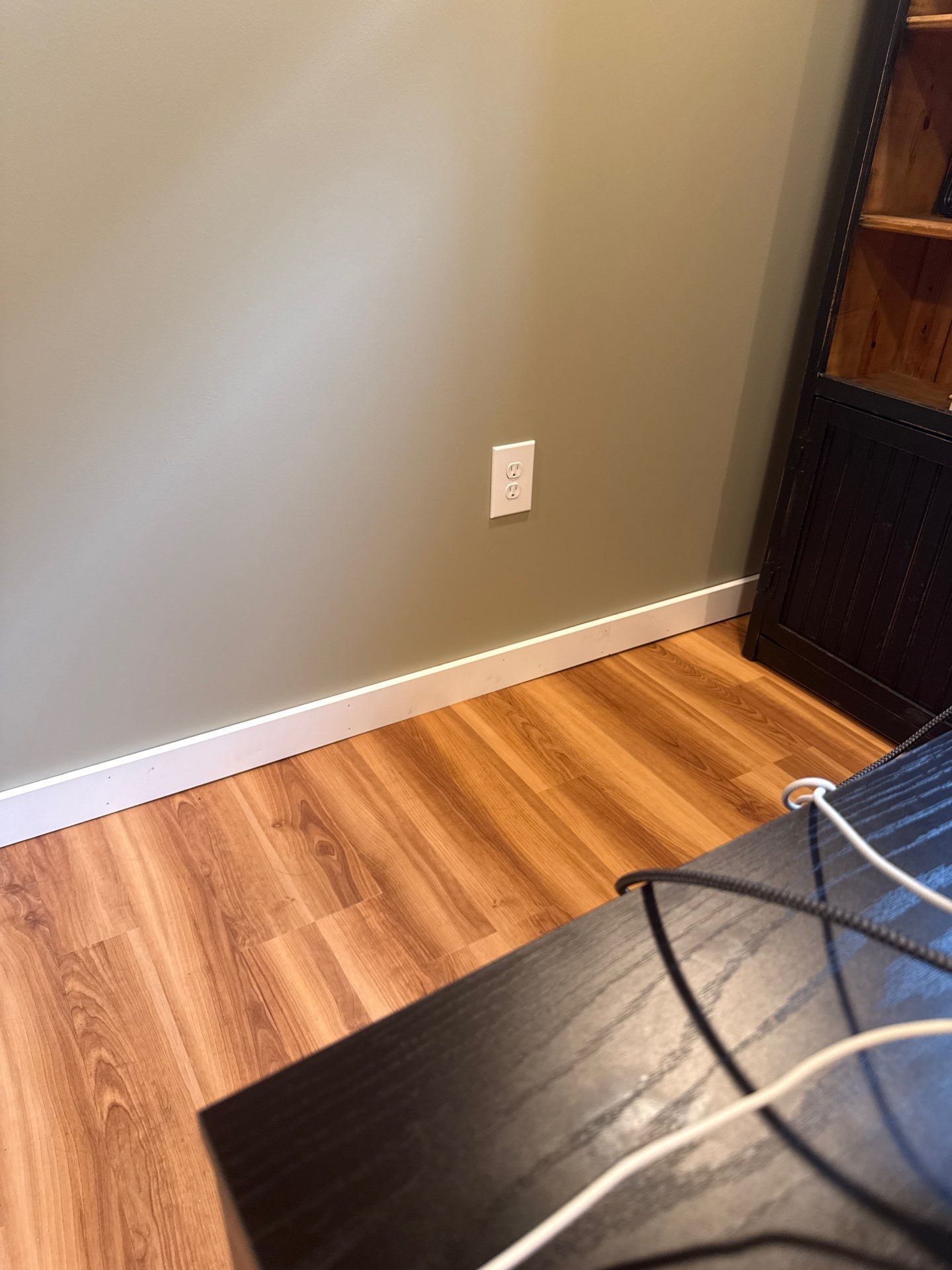 Lincoln Interior Renovation Featuring Sage Green Walls and Laminate Flooring by CompanyCam Sales Demo