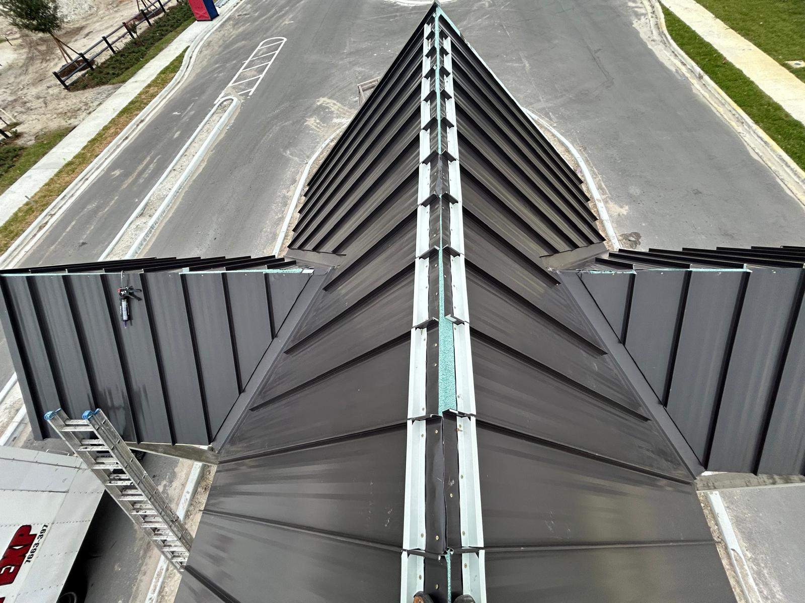 24ga 1.5" Mechanical Seam Dark Bronze by Total Roofing System The Metal Roof Experts