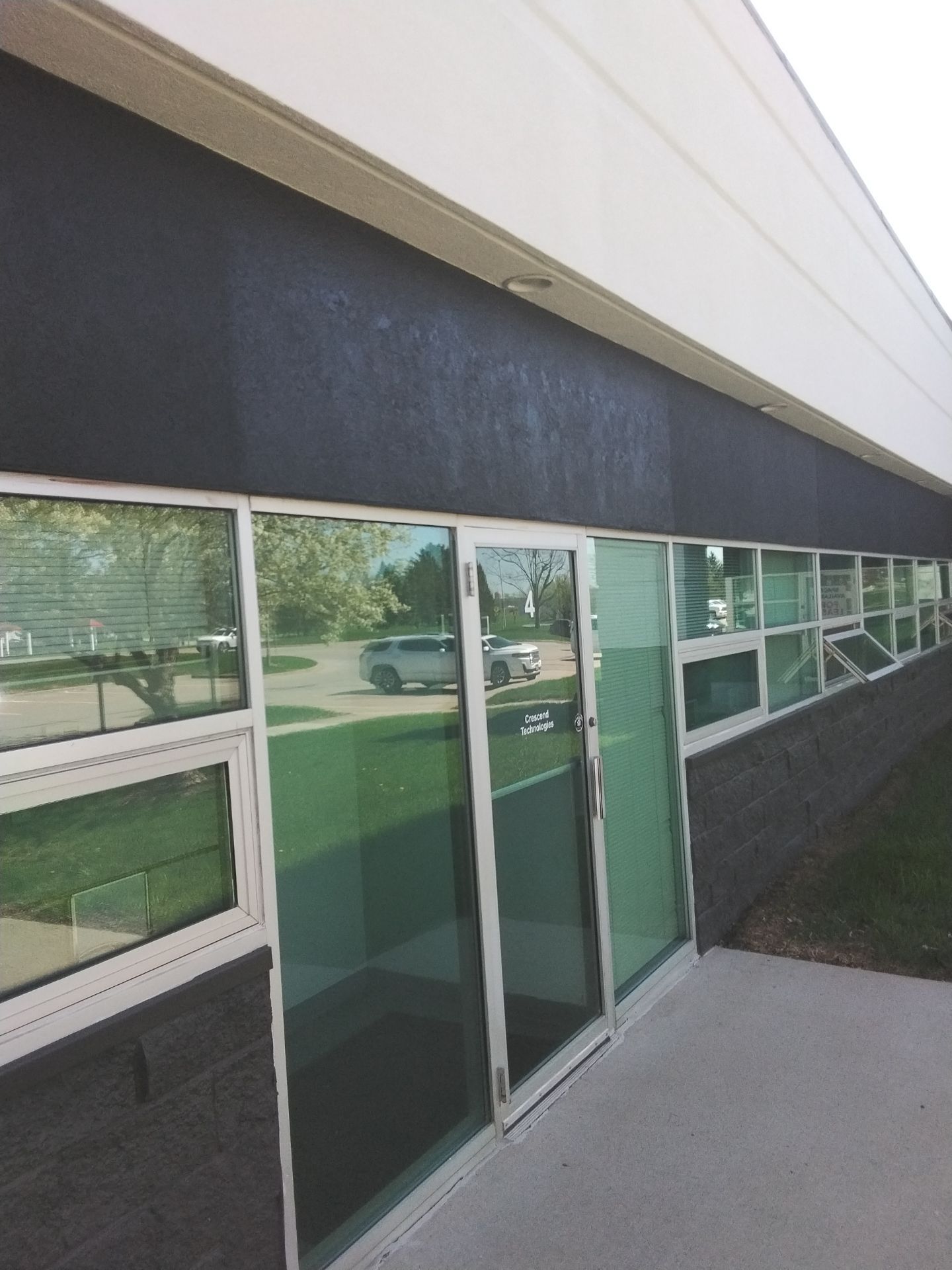 Commercial Exterior Remove Sign, Patch and Repaint by Midwest Paint LLC