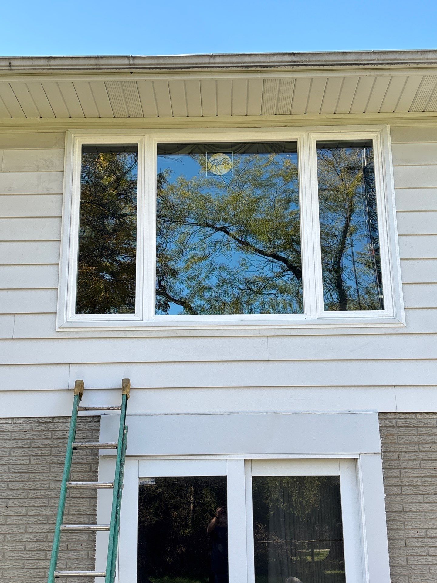 New Windows and Storm Door by 42 North Construction, LLC.