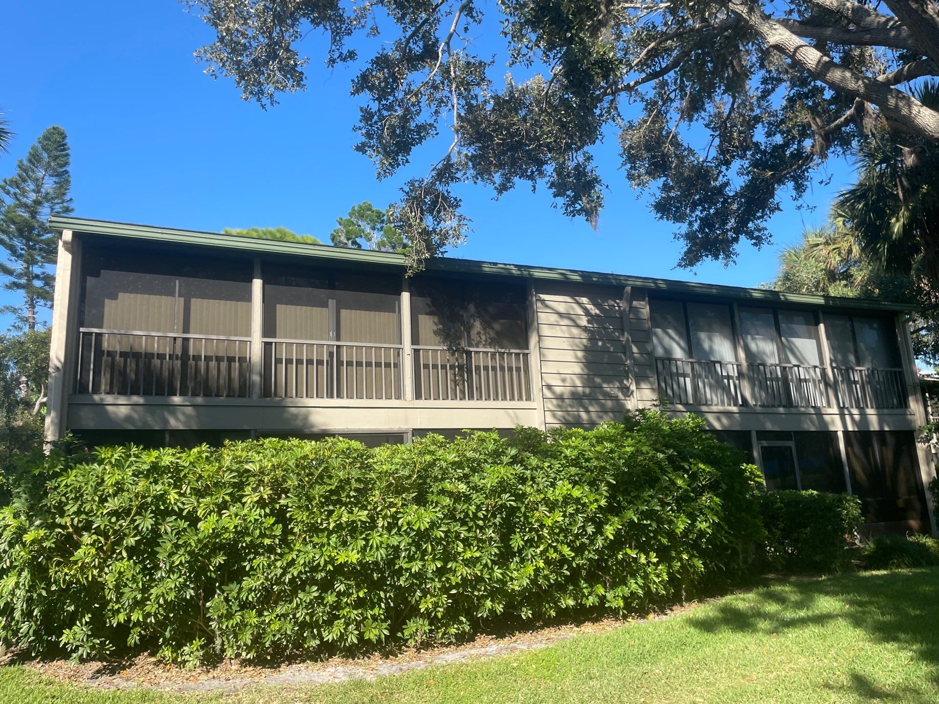 White Gutters Repair and Installation in Sarasota FL by Gutter Professors