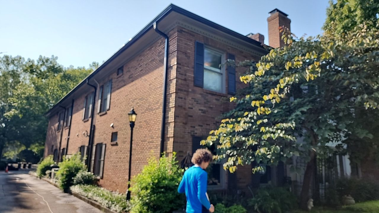 building clean using cleaner by Power Wash Masters LLC