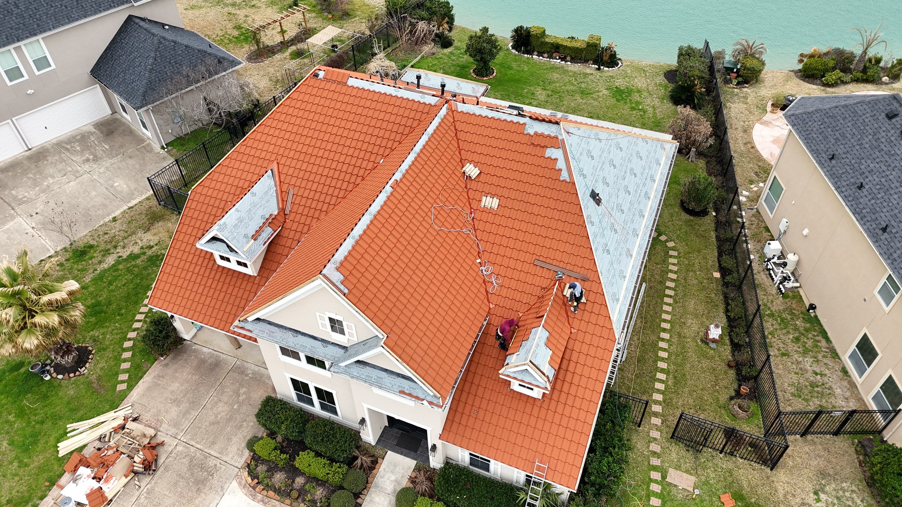 Stunning transformation using DECRA Villa Tile!  by Core Four Roofing