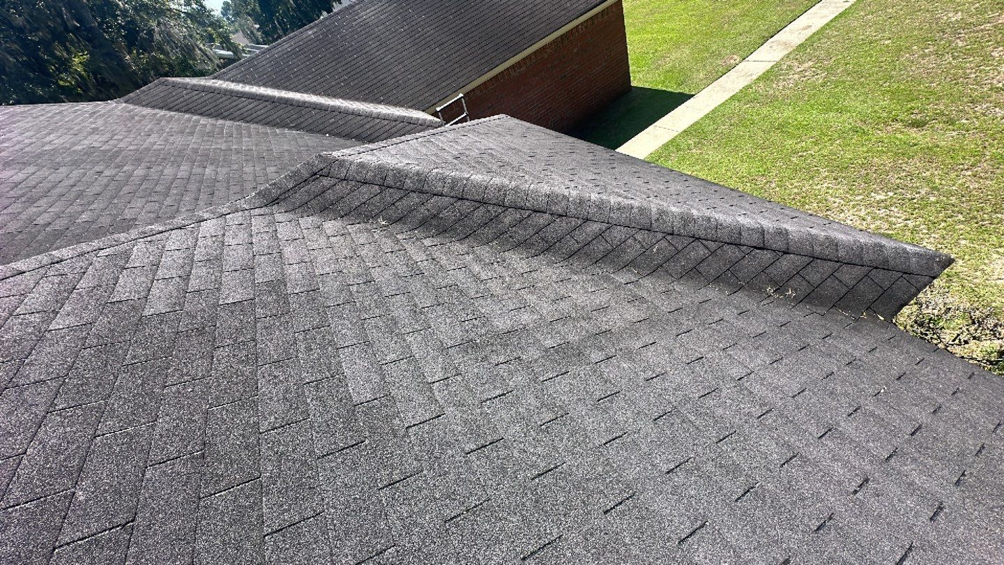 Residential Roofing Installation using Benton 26Ga 1inc Snapcock Metal Roof KYNAR Matte Black by Talya Roofing