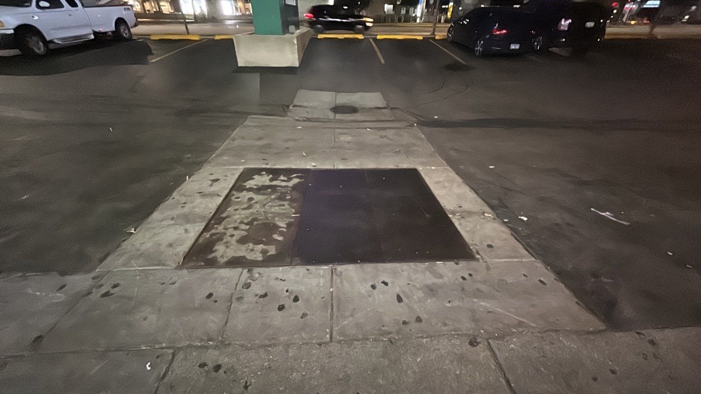 Concrete sidewalk cleaning and degreasing by Northern Power Washing LLC.