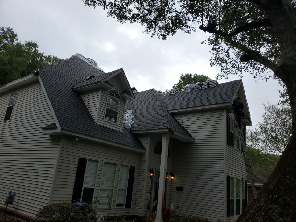 Residential Roofing Installation using Roof Replacement by American Roofing & Construction LLC