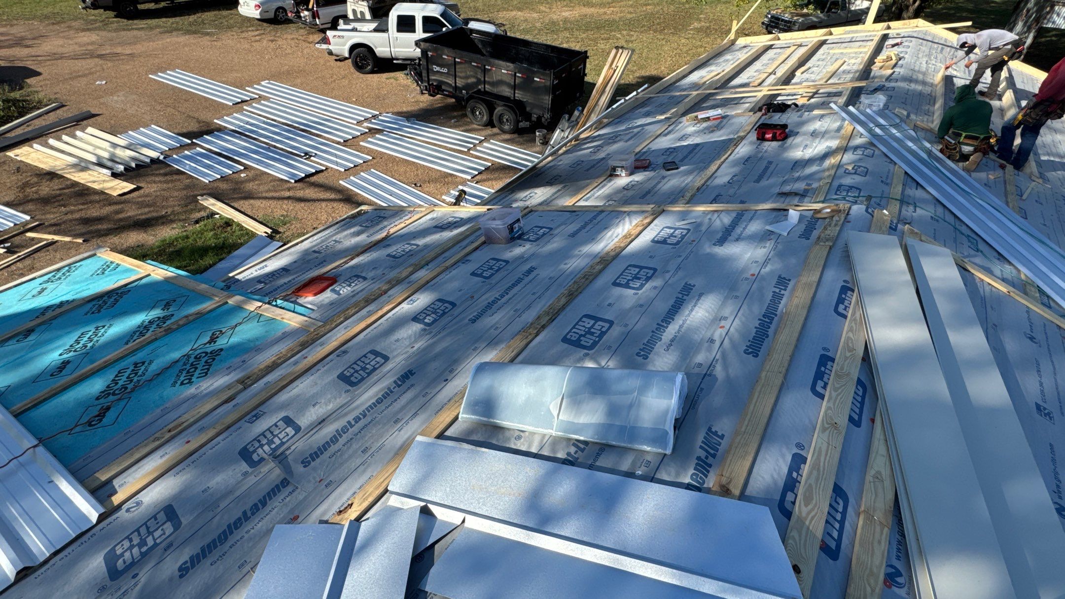 New Metal Roof  by Harvey Roofing & Construction