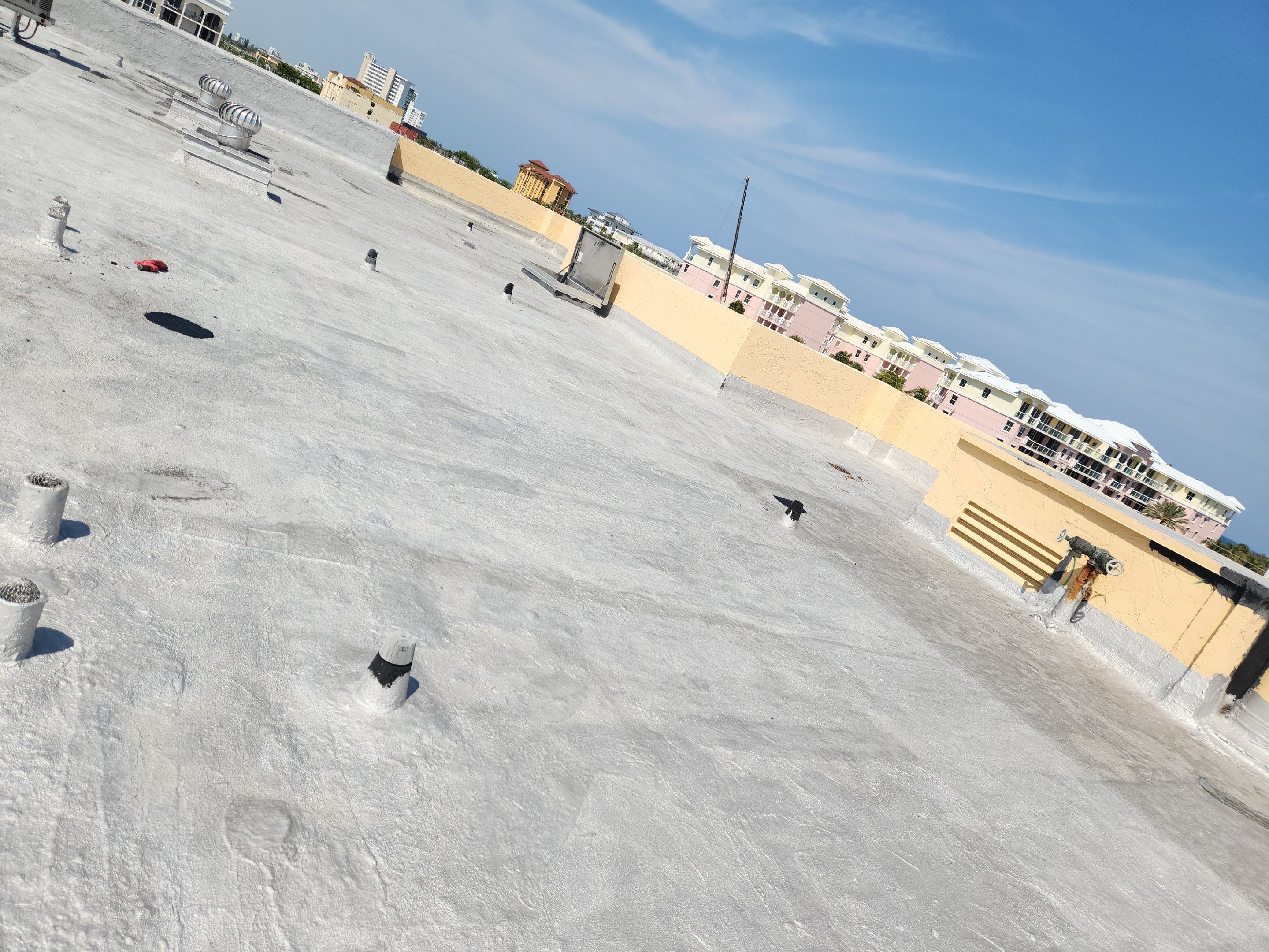 Commercial Flat Roof Repair and Silicone Coating in Deerfield Beach by Aastro Roofing