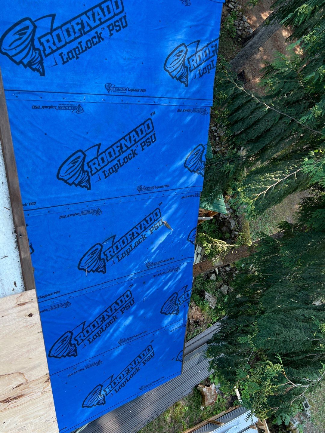 Residential ReRoofing Installation using 12" Prolok metal  by Top Notch Roofing Inc