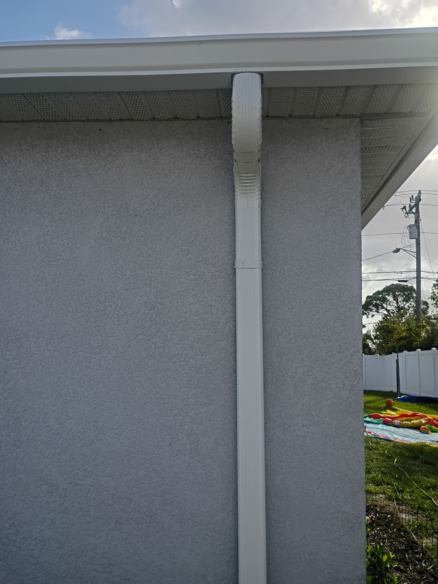 Seamless Aluminum Gutter Installation using K-Style Seamless Gutters in Cape Coral FL by Gutter Professors
