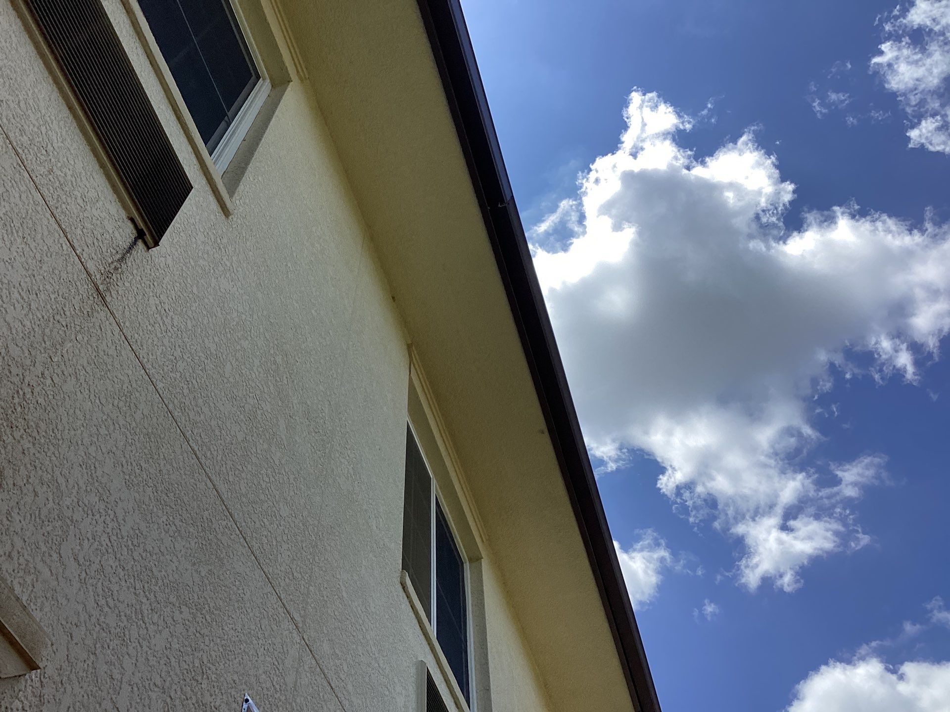 Musket Brown Seamless Gutters using Musket Brown Seamless Gutters in Capen Coral FL by Gutter Professors