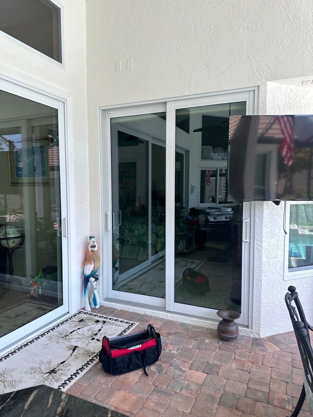 Window Installation using PGT Aluminum for the doors and PGT Vinyl for the Windows  by Windows For Life 