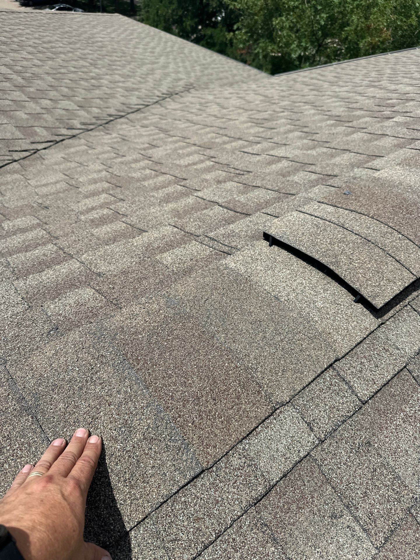 Roof Damage  by Zeus Exteriors