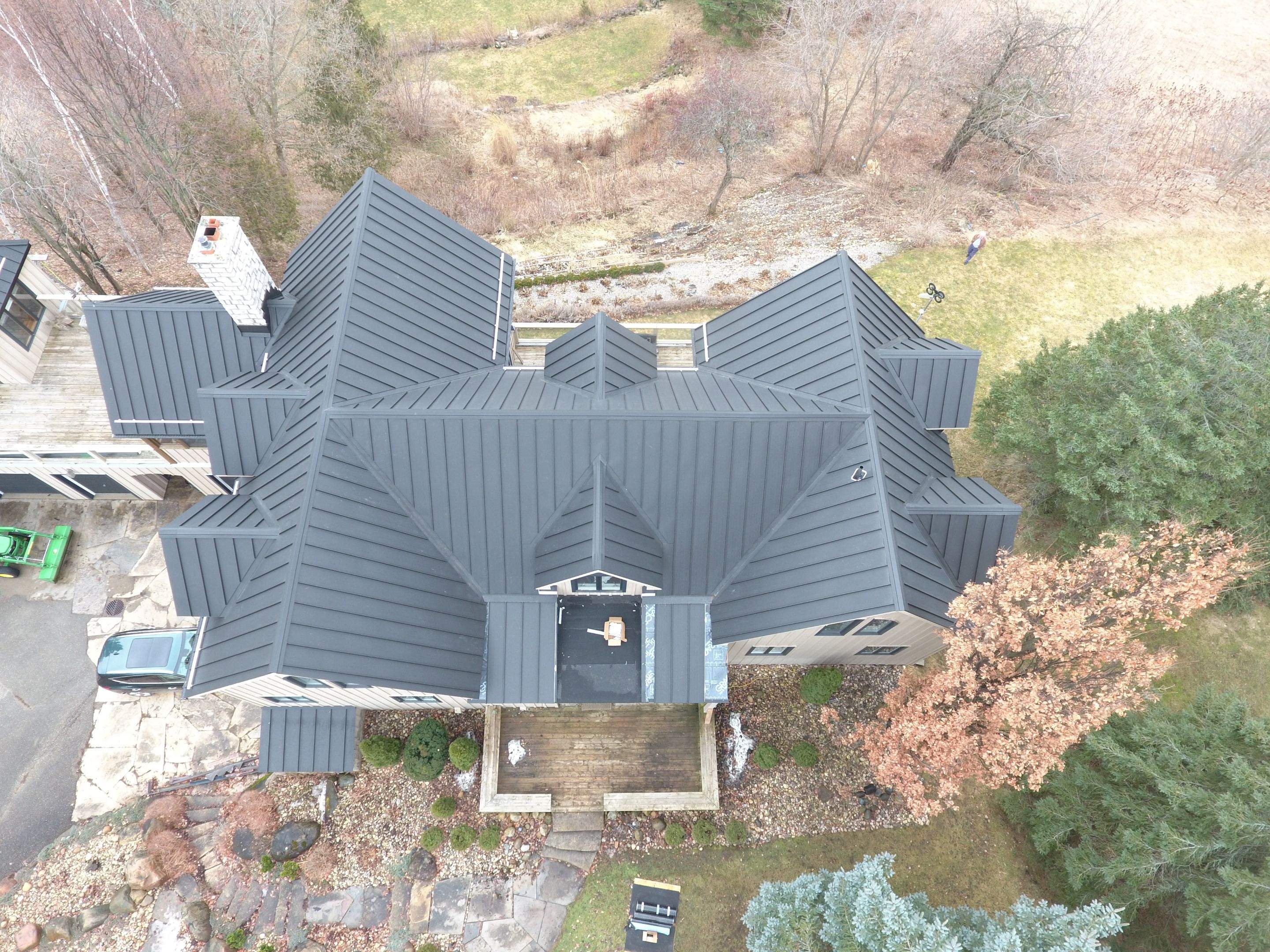 Residential Roofing Installation using 24 Ga Standing Seam Metal by Jay Carter Roofing & Sheet Metal