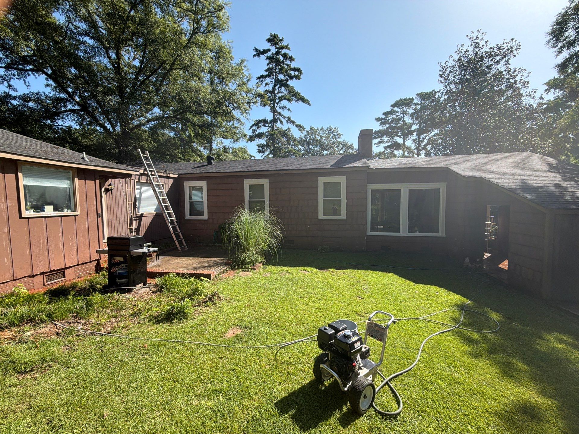 Full Exterior Repaint with Navy Blue and White Trim by Swift Home Renovations
