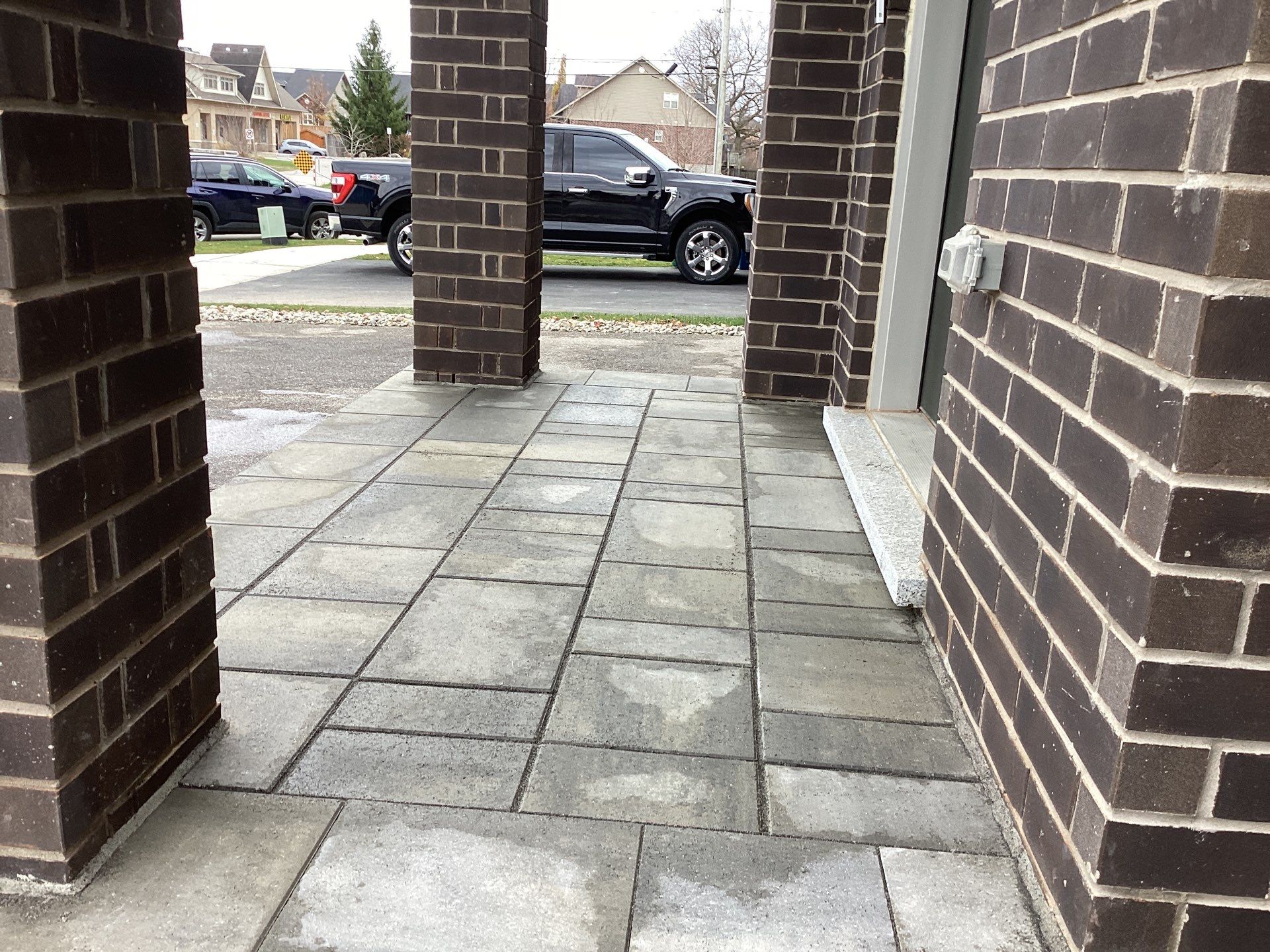 Front Entrance & Lounge Patio by Soares Landscaping