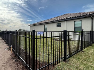 Aluminum Fence Installation using Black 3 Rail Aluminum Fence
