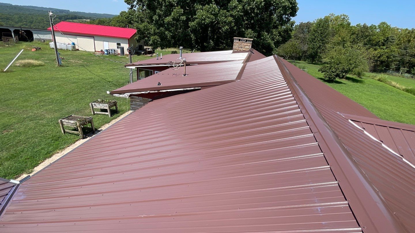 Residential Roofing Install - 29 Gauge G-Rib Metal - Color Brown & Crimson Red by Titan Commercial & Residential Roofing