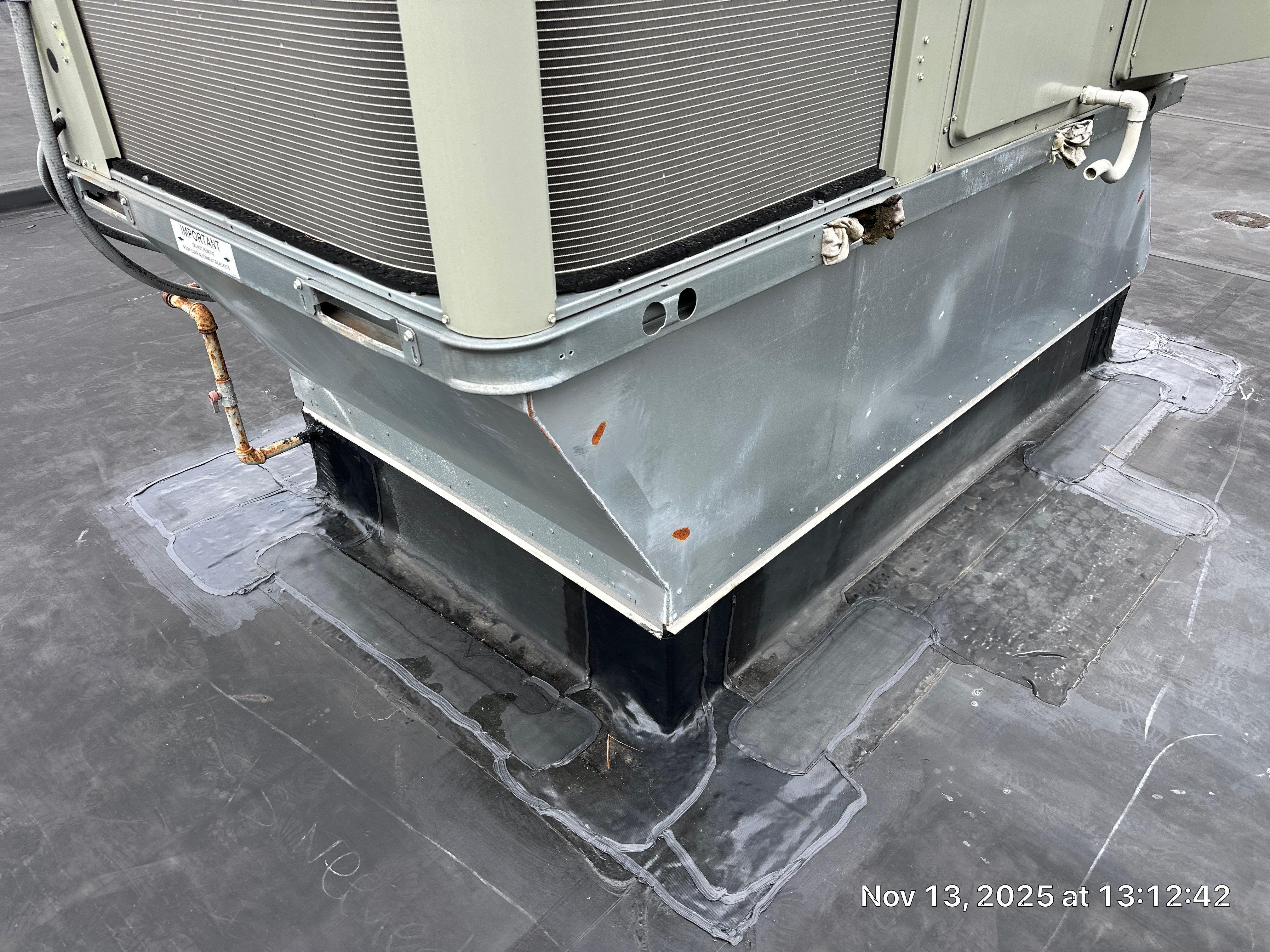 Acton EPDM Roof Edge Reconstruction with Tapered Insulation System by Mighty Dog Roofing of Greater Middlesex County