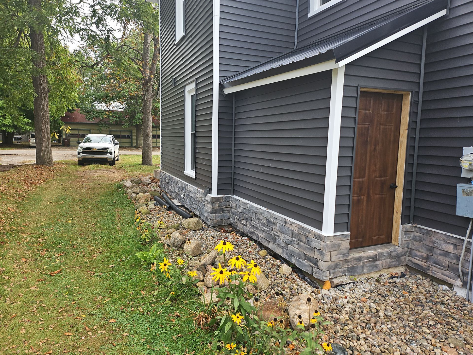 Exterior Makeover using Norandex Siding by Energy Plus Home Improvements
