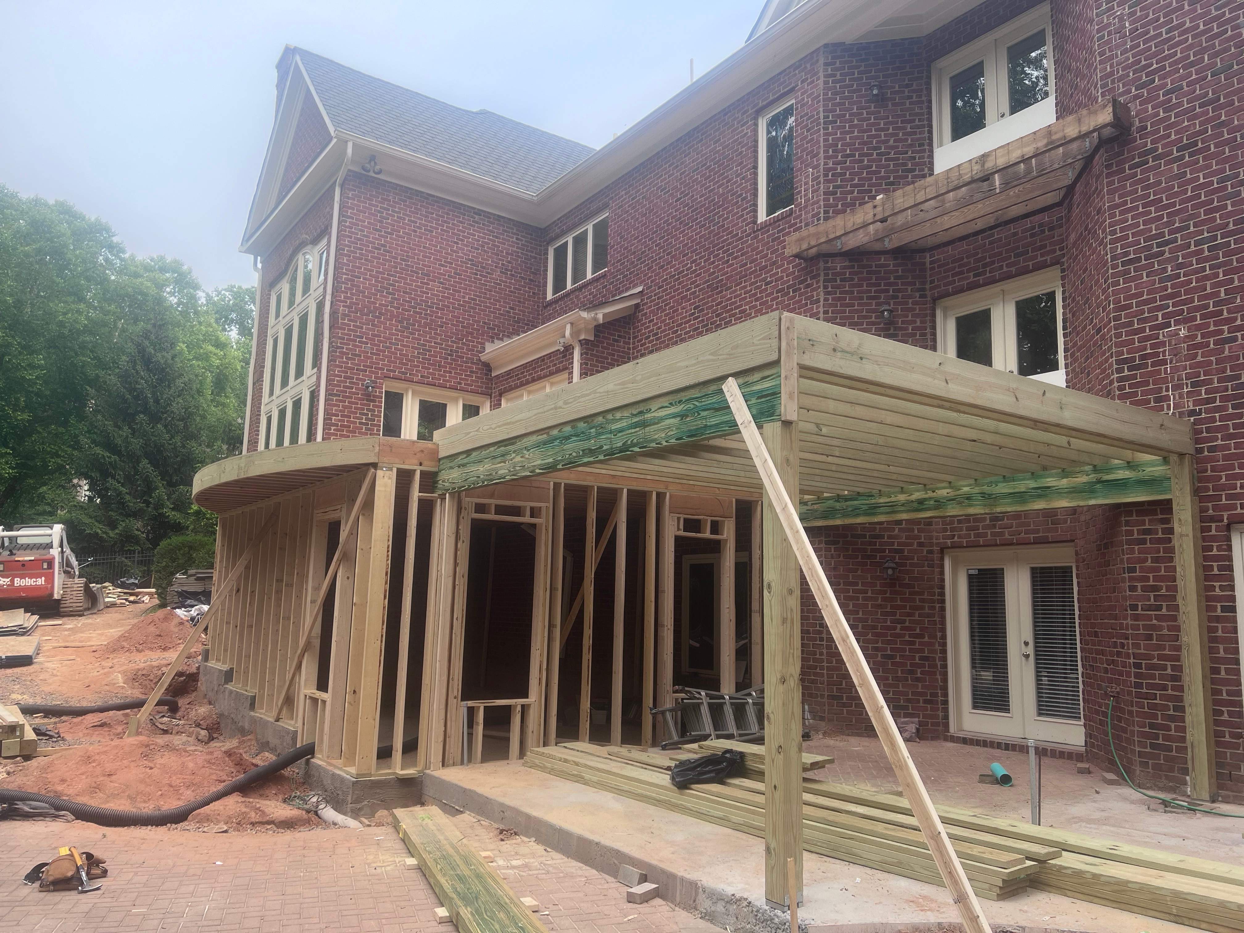 Custom Multi-Level Deck, Outdoor Kitchen & Pool Patio in McLean, VA by Sunburst Construction Inc