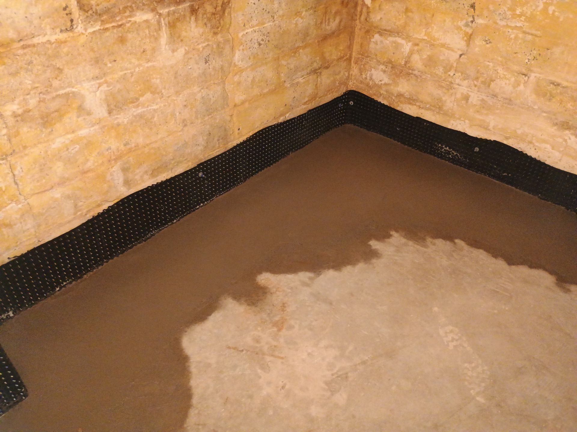 Interior Drain Tile for a South Minneapolis Basement by Waterproofing Northeast