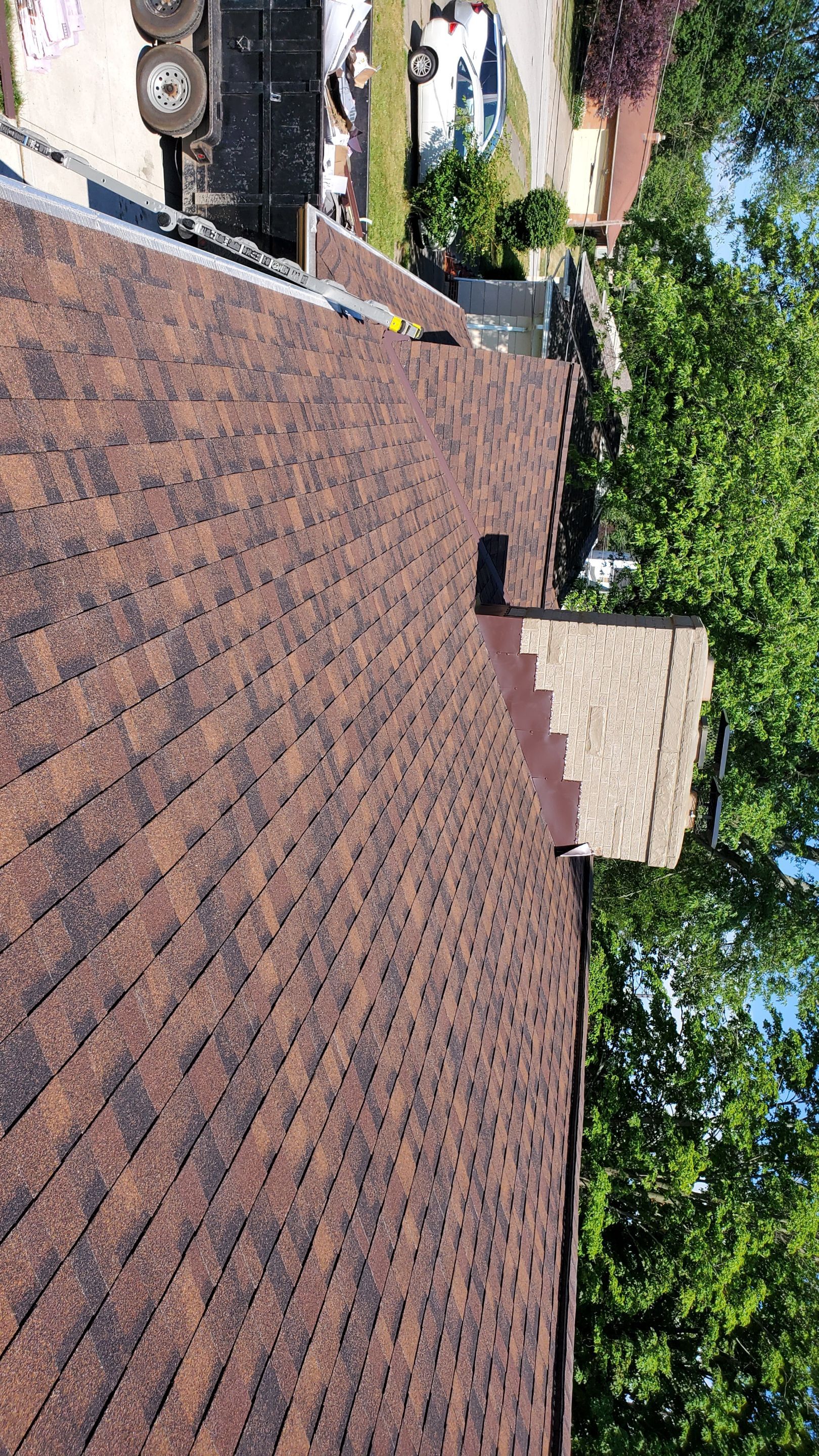 Residential Roofing Installation using Ownens Corning Duration Brownwood by Absolute Roofing and Construction