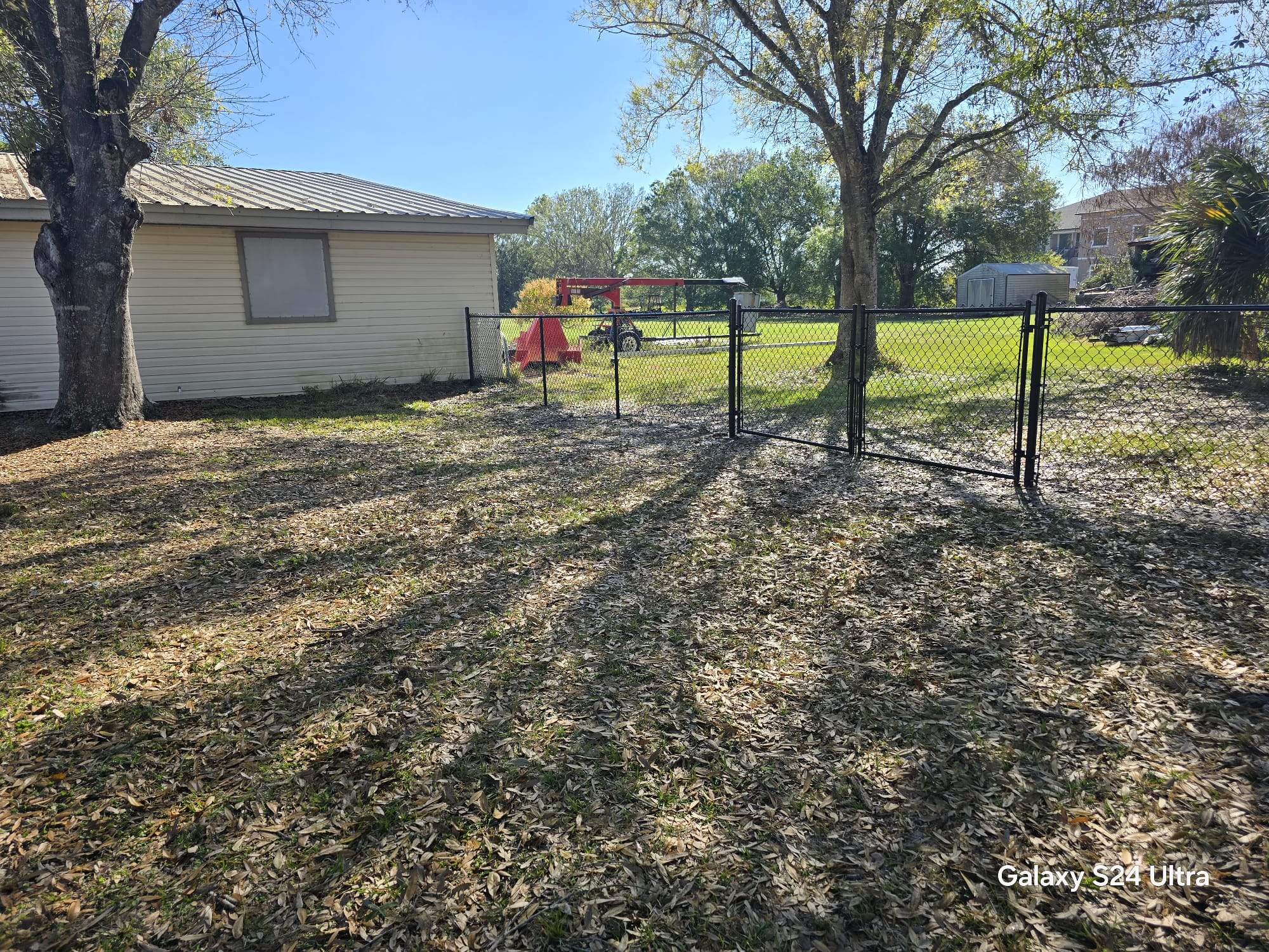 Black Chain Link Fence Installation in Port Charlotte by True Fence LLC