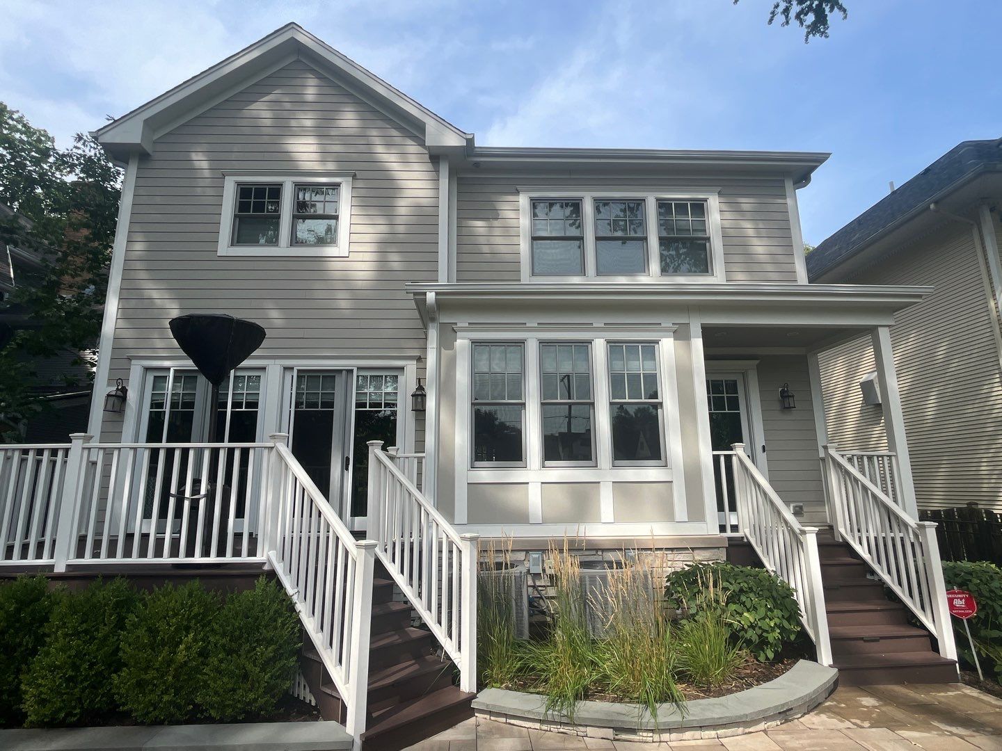 Hardie Board House & Detached Garage Soft Washing by Northern Power Washing LLC.