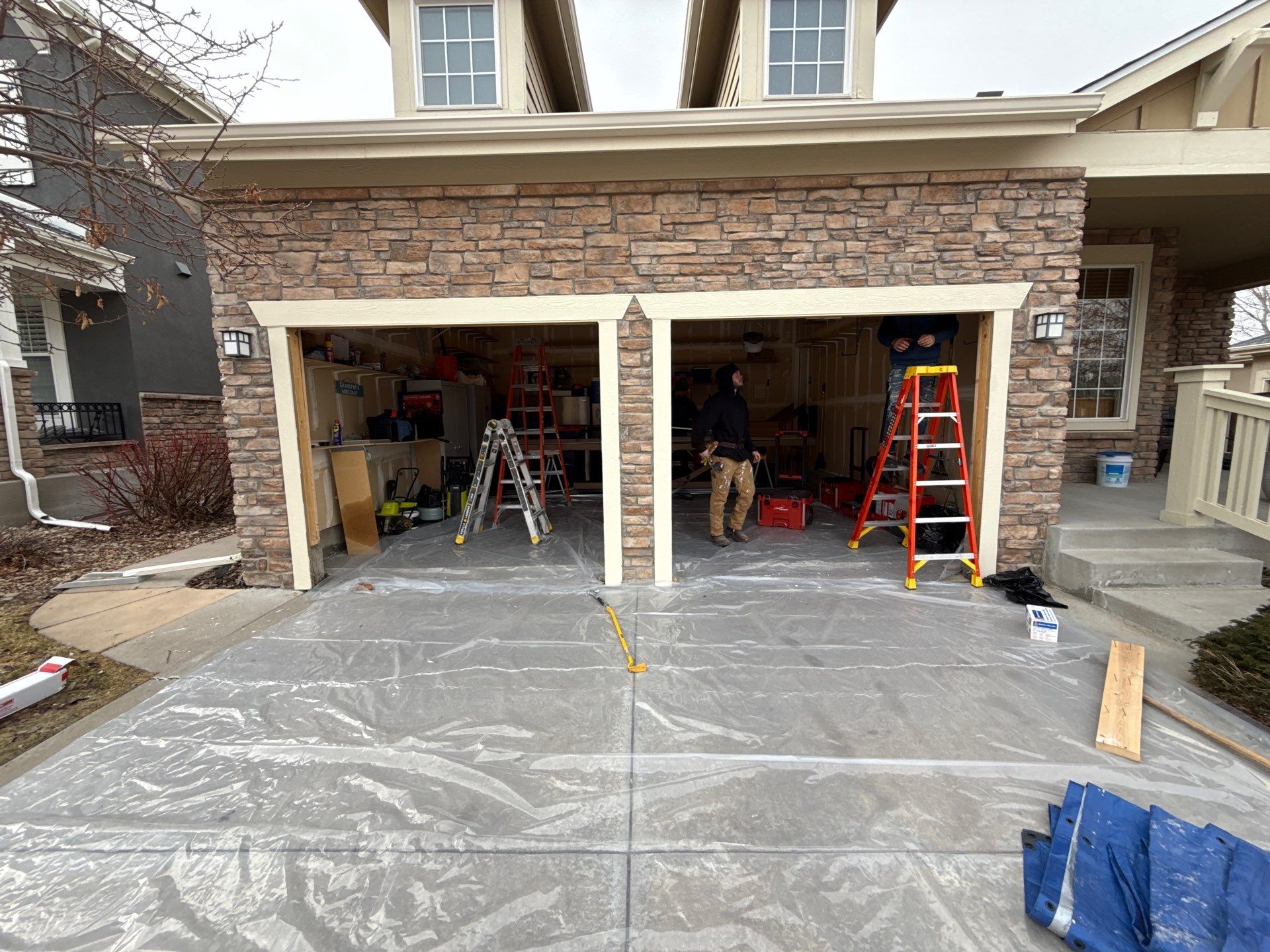 Garage door conversion by David & Goliath Contracting 